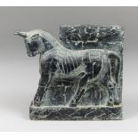 A 20TH CENTURY COMPOSITE BOOKEND OF THE ANCIENT RUINS OF PERSEPOLIS. (h 17cm x w 20.5cm x d 7cm).