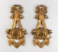 A 19TH CENTURY CARVED PINE PAIR OF ITALIAN NEOCLASSICAL WALL LIGHTS. With original gold gilt