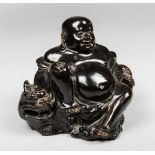 A LATE 19TH/EARLY 20TH CENTURY CHINESE GLAZED EARTHENWARE CENSER FIGURE OF A BUDDHA SEATED ON A