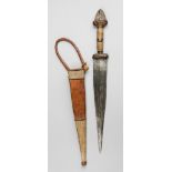 AN EARLY 20TH CENTURY NORTH AFRICAN SUDANESE ARM DAGGER WITH SCABBARD. (37cm). Provenance: Private