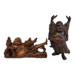 A CHINESE QING DYNASTY HARDWOOD CARVING OF A STANDING BUDDAI Along with Chinese bamboo group carving
