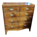 A 19TH CENTURY MAHOGANY CHEST Of two short above three long drawers fitted with brass handles, on