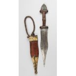 AN EARLY 20TH CENTURY NORTH AFRICAN SUDANESE ARM DAGGER WITH SCABBARD. (34.5cm). Provenance: Private