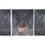 A THREE SECTION CAST IRON FIRE BACK With floral decoration. (120cm x 72cm) Condition: good overall