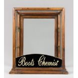 AN EARLY 20TH CENTURY ENGLISH ‘BOOTS CHEMIST’ COUNTER DISPLAY CABINET. With two glass shelves. (h