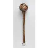 A 19TH CENTURY FIJIAN THROWING CLUB (I ULA DRISIA) WITH BULBOUS ROOT STOCK HEAD. The handle with