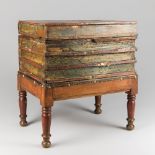 19TH CENTURY ENGLISH FAUX BOOK BOX TABLE. A leather four volume faux book box on painted pine