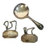 A VICTORIAN SILVER CADDY SPOON Having embossed finial, hallmarked Sheffield, 1870, with kitemark,