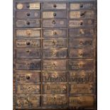 A 19TH CENTURY PINE CLOCK/WATCH REPAIRERS CHEST OF THIRTY DRAWERS AND CONTENTS Comprising verges,