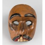 A MID 20TH CENTURY BALINESE TOOTH MASK. (h 15cm x w 13cm x d 7.5cm)