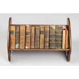 A COLLECTION OF 19TH CENTURY POETRY BOOKS UPON A PERIOD MAHOGANY BOOK STAND. The Poetical Works of