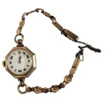 VERTEX, AN EARLY 9CT GOLD LADIES’ WRISTWATCH Octagonal form case, with mechanical movement and a
