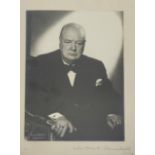 WINSTON CHURCHILL, AUTOGRAPHED PHOTOGRAPH Portrait photograph, signed ‘Winston S. Churchill’ on