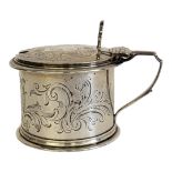 A VICTORIAN SILVER AND BLUE GLASS MUSTARD POT Single handle, hinged lid and engraved scrolled