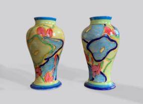 A PAIR OF EARLY 20TH CENTURY CLARICE CLIFF FANTASQUE BIZARRE 'BLUE CHINTZ' VASES. (h 15.5cm x w 8.