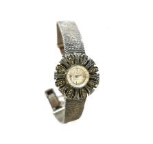 MILUS, A VINTAGE SILVER MARCASITE COCKTAIL WATCH Silver tone dial with marcasite bezel. (approx 2cm)