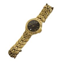 DUNHILL, A VINTAGE GOLD PLATED GENTS WRISTWATCH Having a black tone dial with calendar window and
