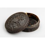 AN EARLY 19TH CENTURY CHINESE CARVED TORTOISESHELL SNUFF BOX AND COVER. The circular box and