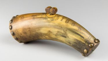 A 19TH CENTURY ENGLISH SCRIMSHAW POWDER HORN Covered in handcrafted scrimshaw detail depicting a