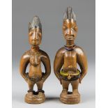 A LATE 19TH/EARLY 20TH CENTURY PAIR OF YORUBA TWIN FIGURES (ERE IBEJI). Yoruba People, Nigeria.