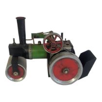 MAMOD, A VINTAGE MODEL TINPLATE STEAM ROLLER ENGINE Having red and green livery, complete with