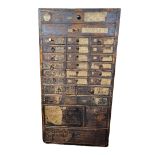 A 19TH CENTURY CLOCK/WATCH REPAIRERS CHEST OF TWENTY-SEVEN DRAWERS AND CONTENTS Comprising of