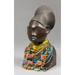 AN EARLY 20TH CENTURY YORUBA PEOPLE CARVED EBONY WOOD FEMALE BUST. Adorned with an interesting array
