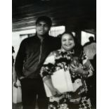 MRS CLAY AND SON, MUHAMMAD ALI AND HIS MOTHER ODESSA CLAY, DUBLIN, 1972, SILVER GELATIN PRINT