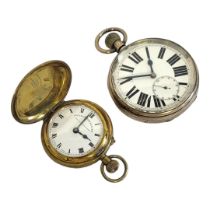 AN EARLY 20TH CENTURY SILVER PLATED OVERSIZED POCKET WATCH/TRAVEL CLOCK Circular white dial with