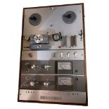 AKAI, A MID CENTURY REEL TO REEL TAPE RECORDER Model M-9, in wooden cars, together with earphones,