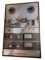 AKAI, A MID CENTURY REEL TO REEL TAPE RECORDER Model M-9, in wooden cars, together with earphones,