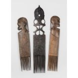 A COLLECTION OF LARGE WEST AFRICAN CARVED WOOD COMBS. Largest (49.5cm). Provenance: Private
