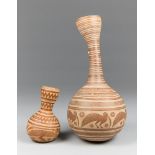 TWO MID 20TH CENTURY CARVED NIGERIAN CALABASH DRIED GOURD VASES. Made from dried out gourds,