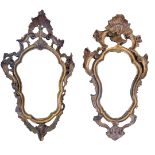 A MATCH PAIR OF EARLY 19TH CENTURY GILTWOOD FRAMED MIRRORS With pierced shell crest above an ogee