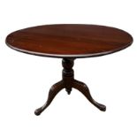 A 19TH CENTURY MAHOGANY CIRCULAR TILT TOP TRIPOD TABLE.