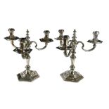 C.J. VANDER LTD, AN IMPRESSIVE PAIR OF SOLID SILVER CANDELABRAS, HALLMARKED LONDON, 1965 Having