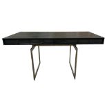 JULIAN CHICHESTER, A BLACK VELLUM CORTES DESK With three drawers, raised on gilt metal supports. (