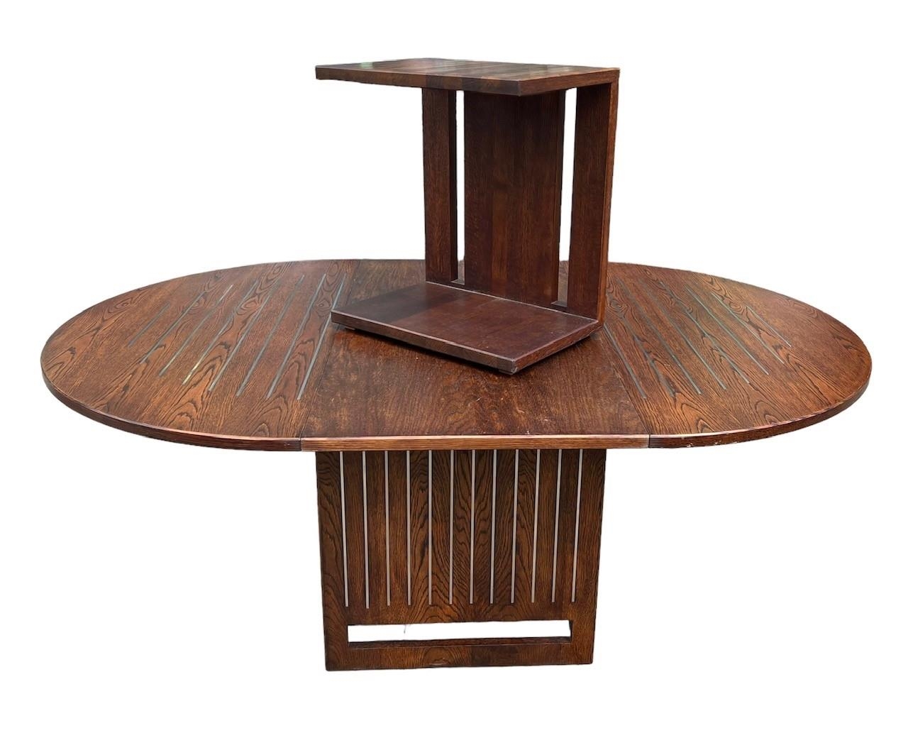 A CONTEMPORARY OAK AND STEEL INLAY DRAW LEAF DINING TABLE With single leaf, together with a matching - Image 5 of 7