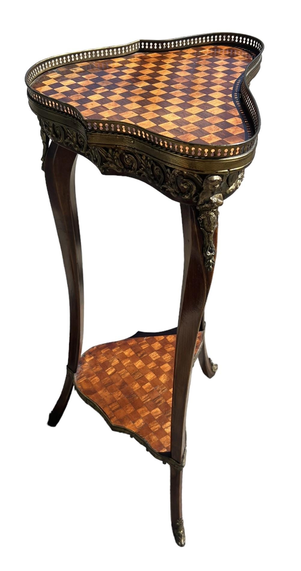 A LOUIS XVI DESIGN FRUITWOOD AND GILT METAL MOUNTED TWO TIER OCCASIONAL TABLE. (h 81cm x d 28.5cm - Image 3 of 4