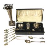 SELFRIDGE & CO. LTD, A CASED SILVER CRUET SET, HALLMARKED BIRMINGHAM 1913. TOGETHER SILVER SPOONS,