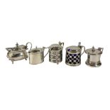 A COLLECTION OF FIVE EDWARDIAN AND LATER SILVER MUSTARD POTS Examples comprising J. Beach & Co.,