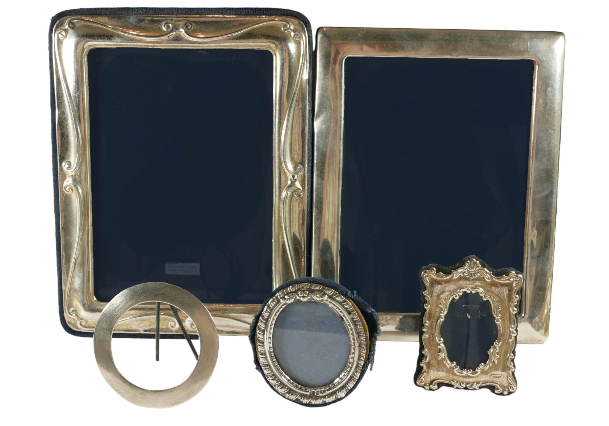 CARRS OF SHEFFIELD, A SILVER PICTURE FRAME TOGETHER WITH TWO LARGE SILVER PICTURE FRAMES AND TWO