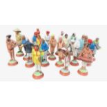 A LATE 19TH/EARLY 20TH CENTURY COLLECTION OF INDIAN PAINTED CLAY FIGURES. (average h 10.8cm)