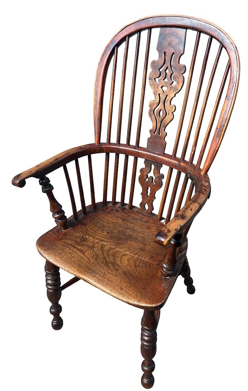 A 19TH CENTURY YEW WOOD AND ELM WINDSOR CHAIR The pierced splat and turned spindles above a solid - Image 2 of 3