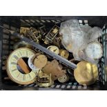 A COLLECTION OF 19TH CENTURY AND LATER BRASS CLOCK MOVEMENTS Along with enamelled dials and springs.