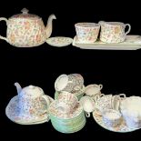 MINTON, A 20TH CENTURY PORCELAIN 'HADDON HALL' TEA SET Comprising two teapots, sugar basin, cream