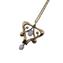 AN ART NOUVEAU 9CT GOLD AND OPAL PENDANT NECKLACE Two cabochon cut stones in a pierced design on a