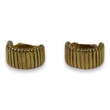 CHRISTIAN DIOR, A PAIR OF GOLD TONE EARRINGS Having clip on backs. (18mm x 10mm x 16mm)