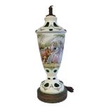 A BOHEMIAN DESIGN OVERLAID GLASS LAMP Hand painted decoration of figures wearing 18th Century attire