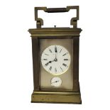 A LATE 19TH/EARLY 20TH CENTURY GILT BRASS REPEATER ALARM CARRIAGE CLOCK Having a circular white dial